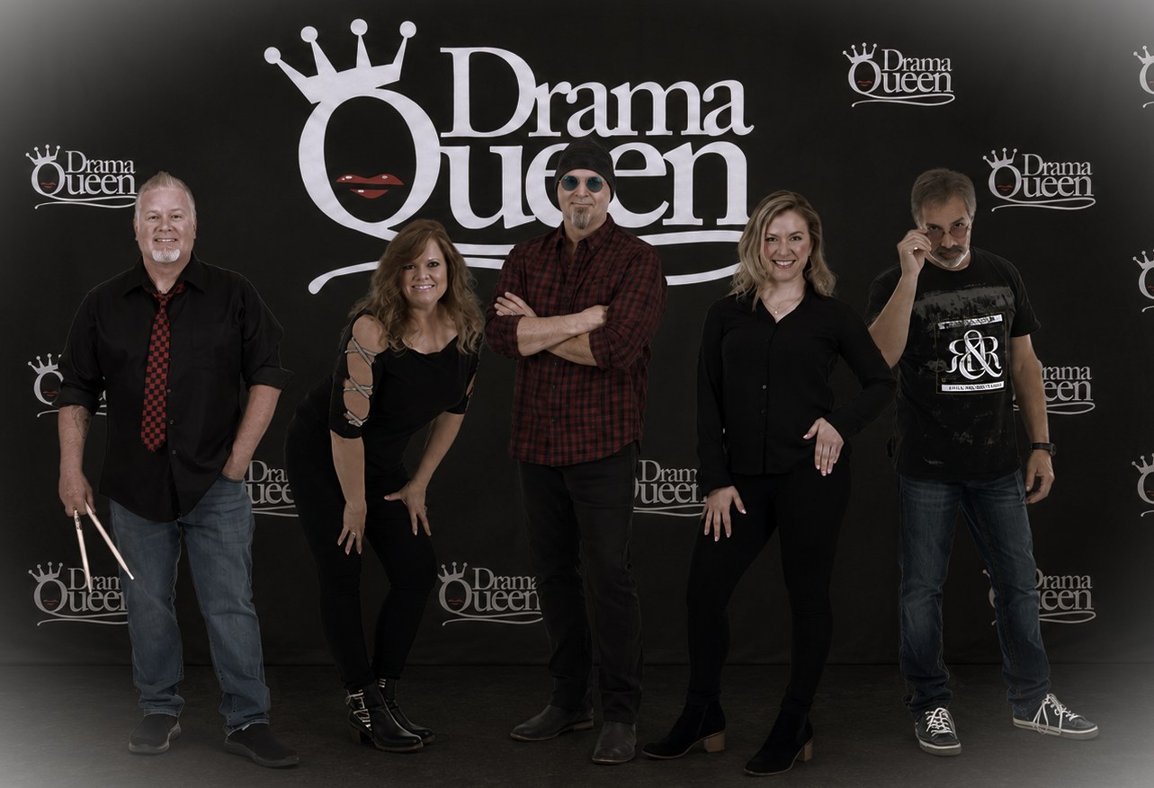 Drama Queen band members posed in front of a Drama Queen backdrop
