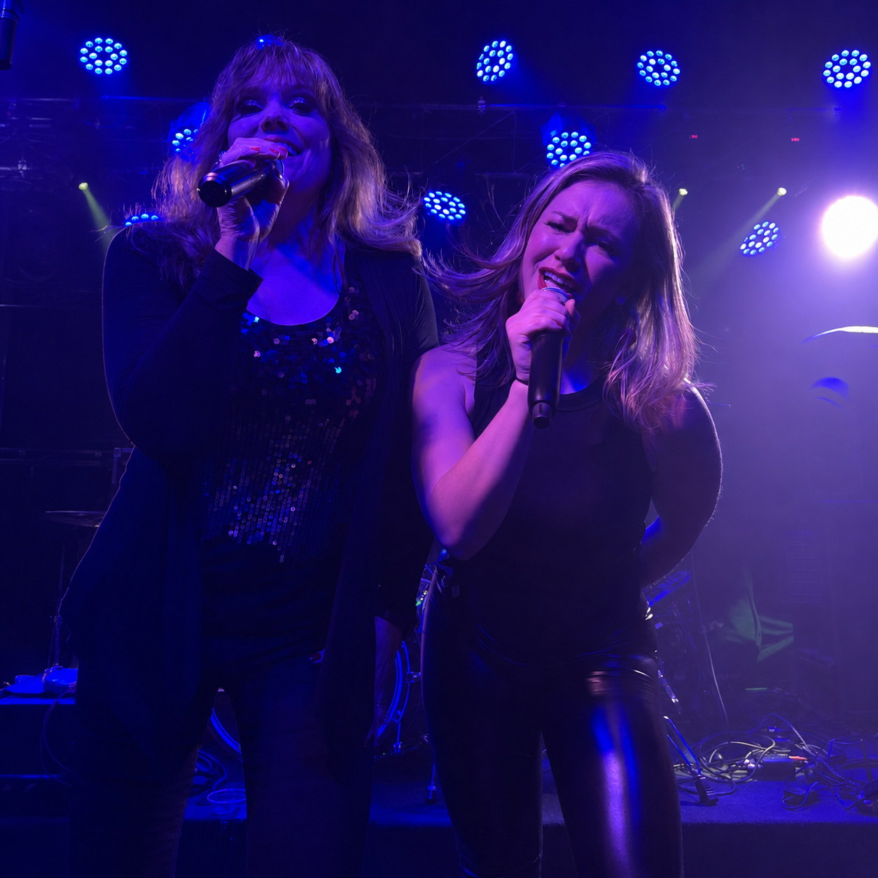 Joan and Christa singing together