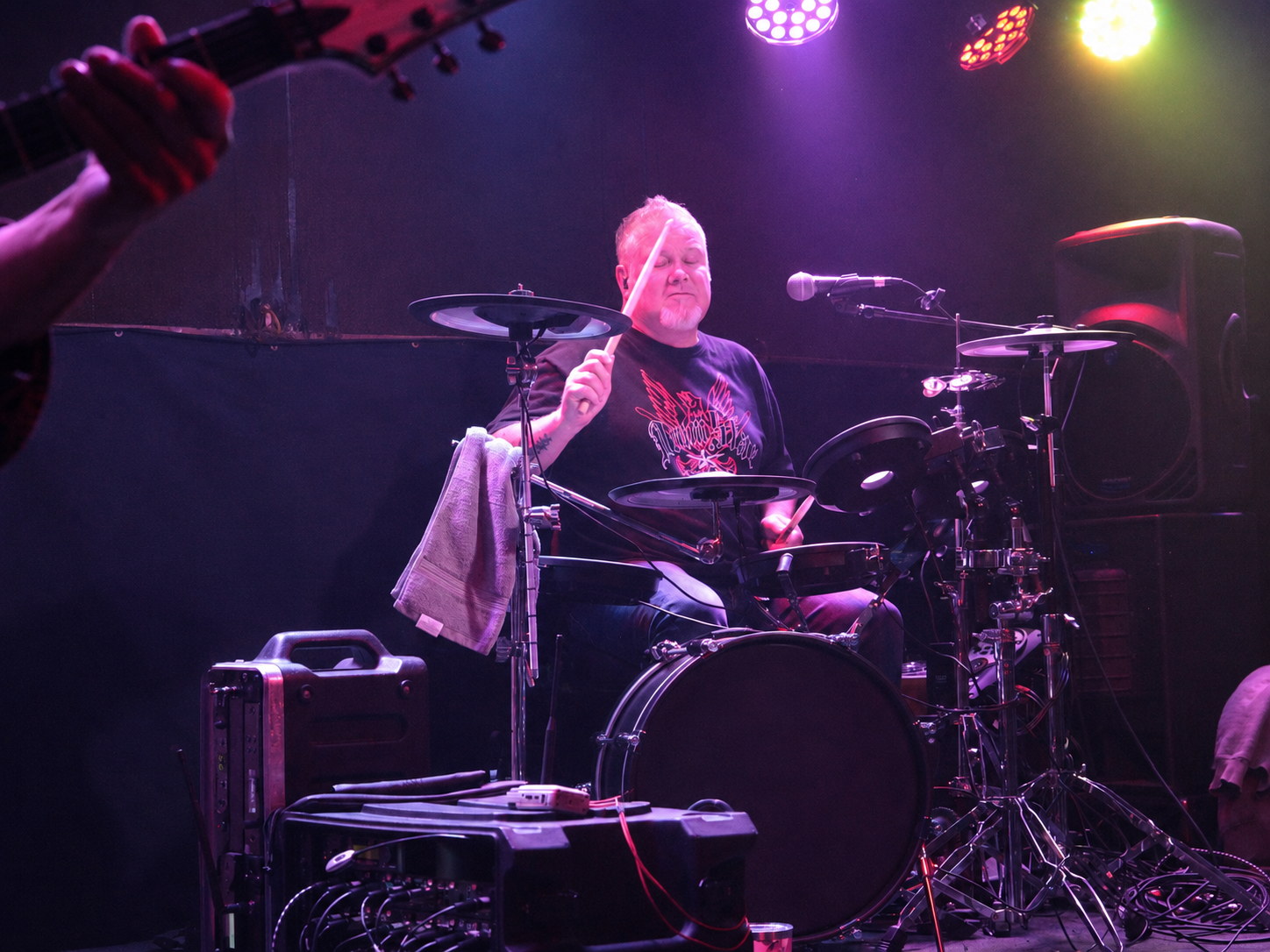 Mark performing on drums