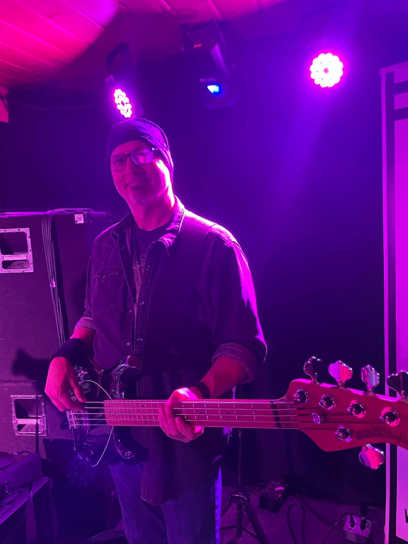 TK performing on bass