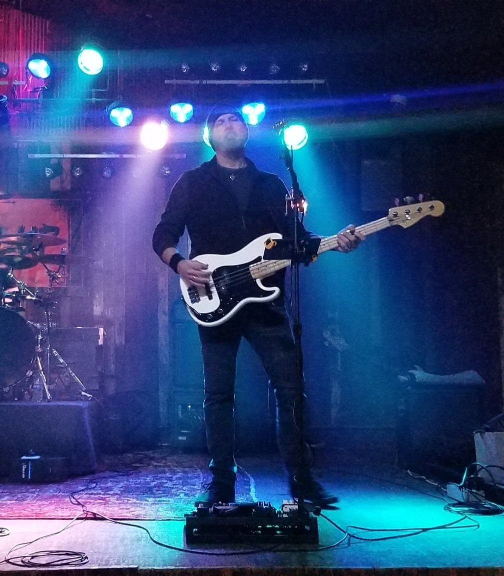 TK performing with white bass